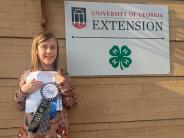 Mara Salmon - Divisional Win award with her poem titled "Rabbit Friends"