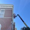 2.2026 Historic Courthouse work by Midwest Maintenance, Inc. -  cleaning, painting soffit, and brick pointing.