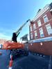2.2026 Historic Courthouse work by Midwest Maintenance, Inc. -  cleaning, painting soffit, and brick pointing.